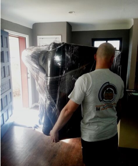 movers moving a couch